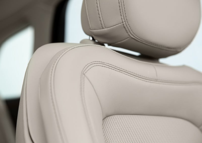 A detail shot of available leather-trimmed Perfect Position front seat shows off artistic details like luxe materials, precision stitching and supple curves | Fair Oaks Lincoln in Naperville IL