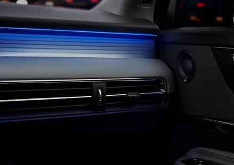A thin available ambient blue lighting illuminates the pinstripe aluminum under an ebony dashboard, emitting a cool energy | Fair Oaks Lincoln in Naperville IL