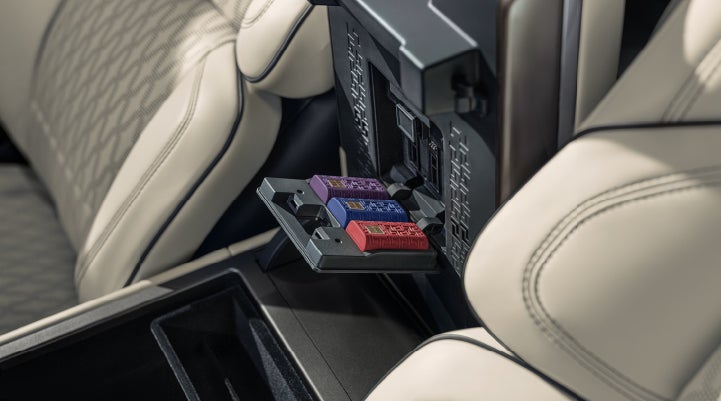 Digital Scent cartridges are shown in the diffuser located in the center arm rest. | Fair Oaks Lincoln in Naperville IL